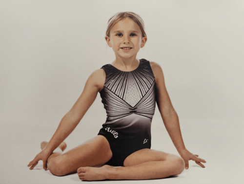 Photo of Vera posing in her leotard